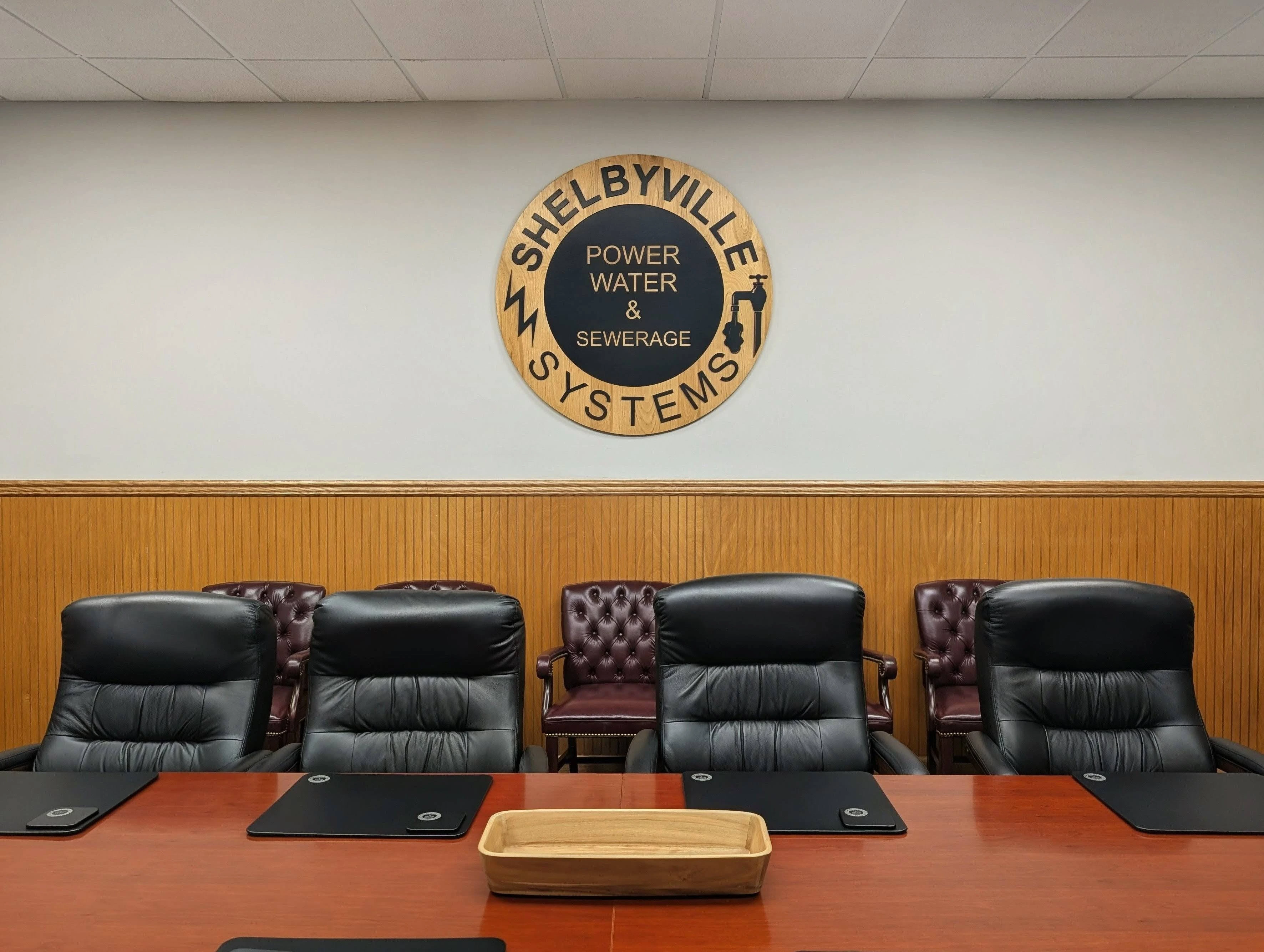 Photo of the Shelbyville Power & Water System wooden logo.